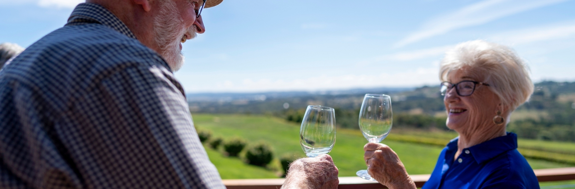 a older couple enjoying a glass of wine