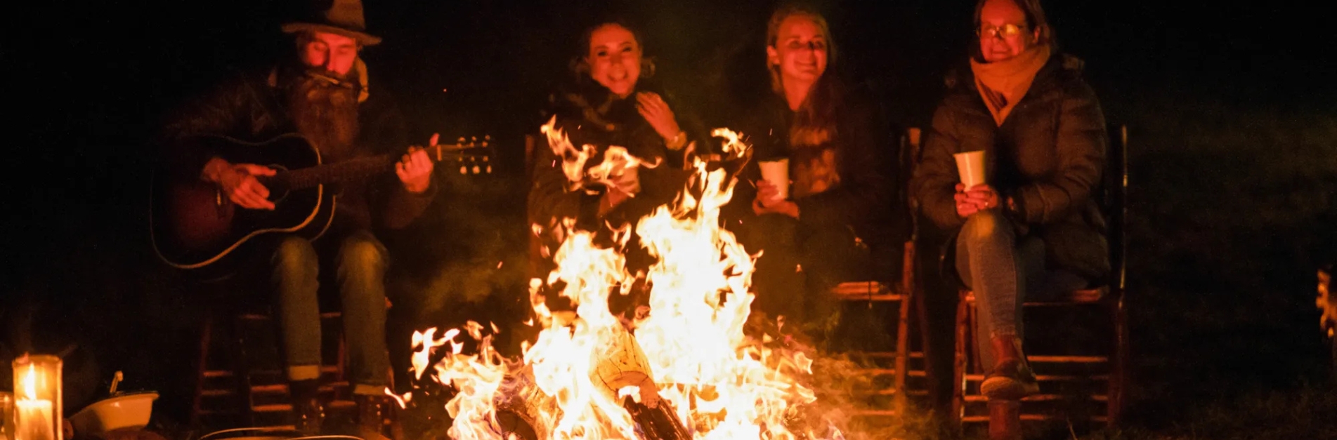 people sitting around fire at the Orange Region Fire Festival