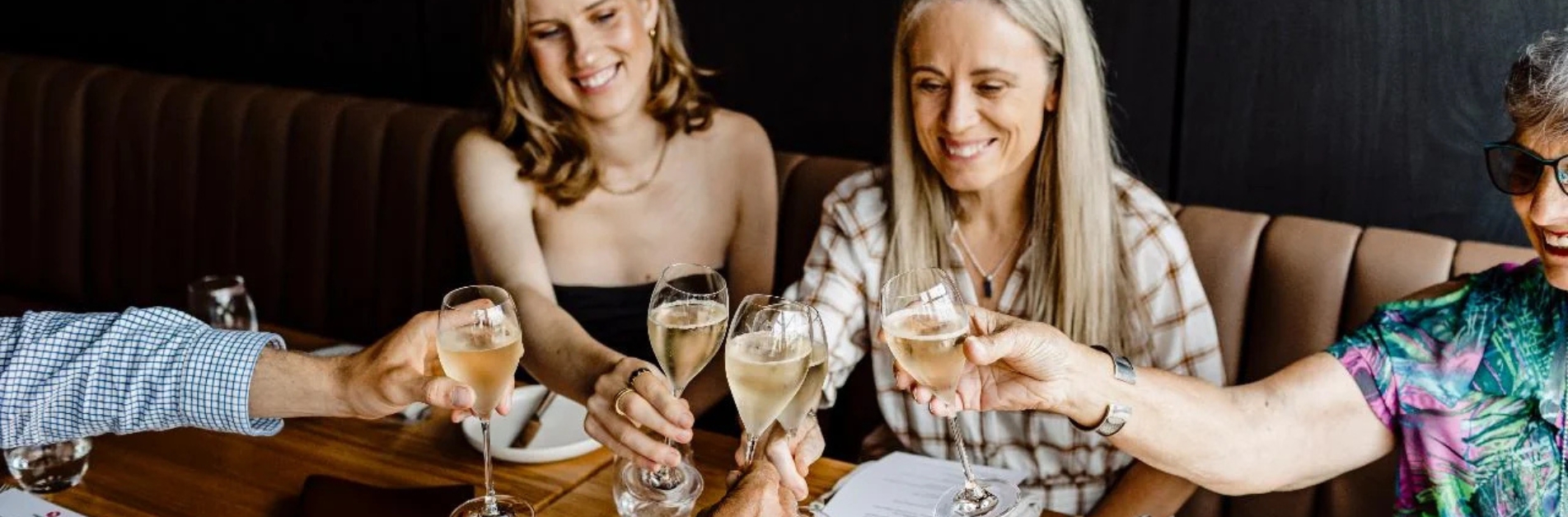 printhie wines Guests raising glasses of sparkling wine during a tasting at Printhie Wines in Orange, NSW, enjoying the winery's relaxed cellar door experience.
